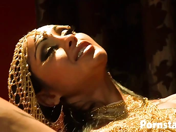 Priya Rai's screams turn into screams of pleasure as Gigantic Pecker drills her stiff on the bed